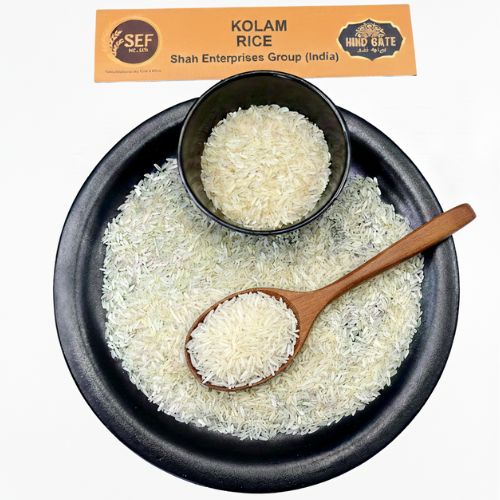 Kolam Rice served in plate and bowl – short-grain everyday Indian rice.